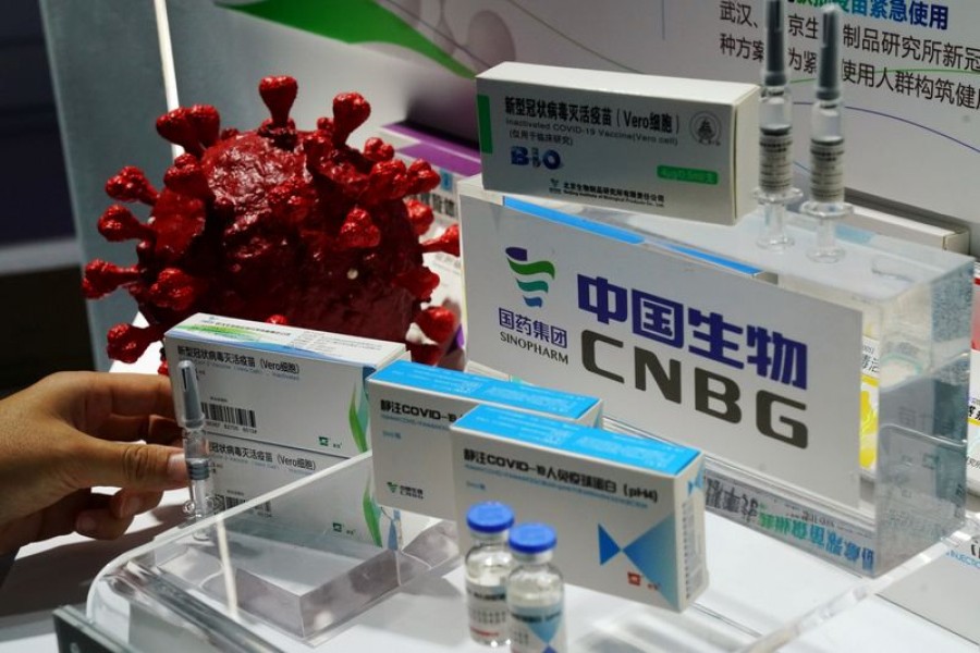 A booth displaying a coronavirus vaccine candidate from China National Biotec Group (CNBG), a unit of state-owned pharmaceutical giant China National Pharmaceutical Group (Sinopharm), is seen at the 2020 China International Fair for Trade in Services (CIFTIS), following the COVID-19 outbreak, in Beijing, China September 4, 2020. REUTERS/Tingshu Wang