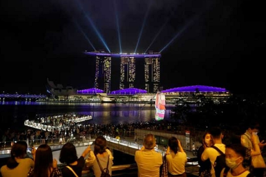 Singapore considers relaxing curbs for vaccinated travellers as WEF nears