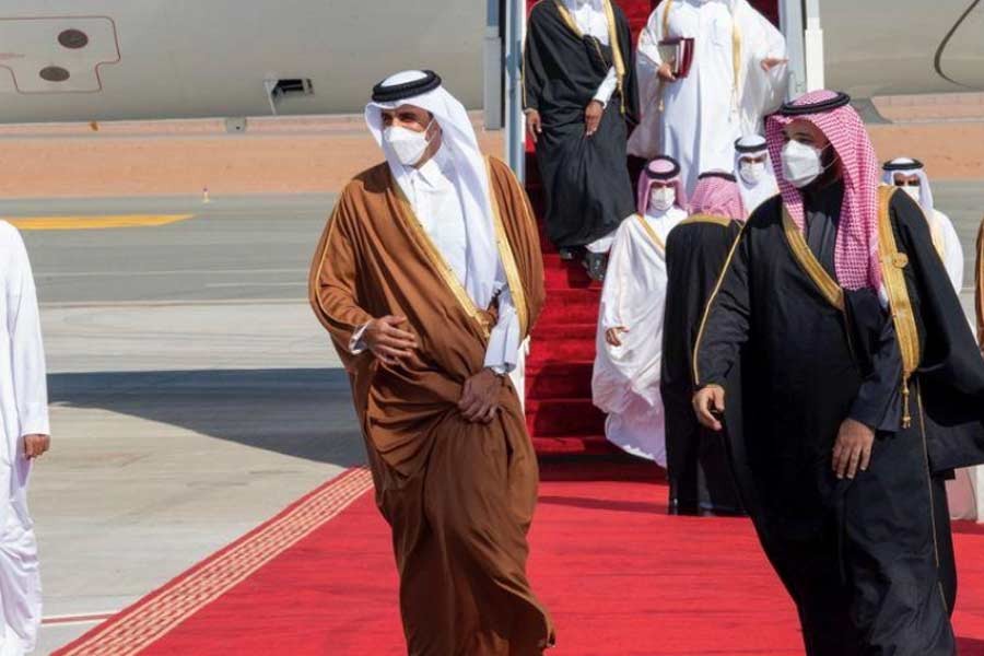 Saudi Arabia's Crown Prince Mohammed bin Salman receiving Qatar's Emir Sheikh Tamim bin Hamad al-Thani upon his arrival to attend the Gulf Cooperation Council's (GCC) 41st Summit in Al-Ula, Saudi Arabia on Tuesday –Reuters photo  