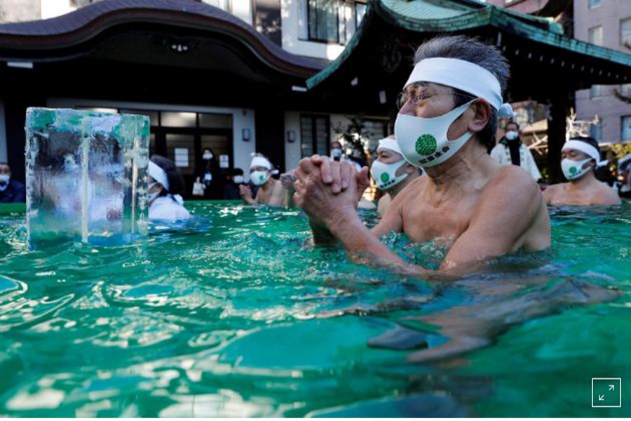 Japanese pray for end to pandemic in annual ice bath ritual