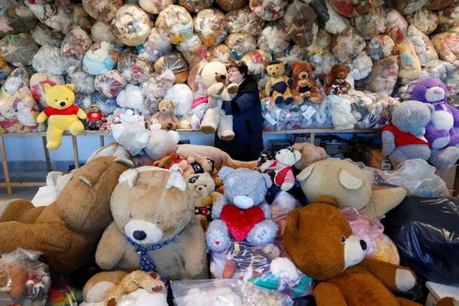 Valeria Schmidt, nicknamed as 'Teddy Bear Mama', hugs a teddy bear in Harsany, Hungary on January 11, 2021 — Reuters photo