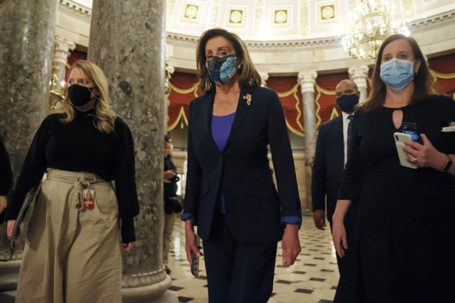 US House Speaker Nancy Pelosi (D-CA) walks to the floor of the House of Representatives to begin the voting process on a resolution demanding Vice President Pence and the cabinet remove President Trump from office, at the US Capitol in Washington January 12, 2021. Reuters