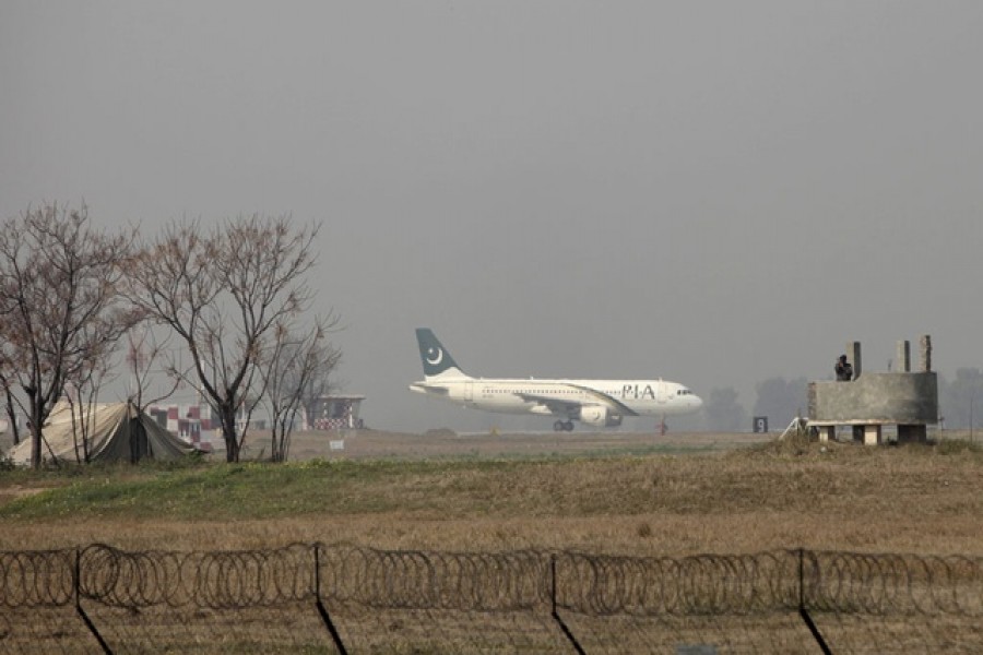 A Pakistan International Airlines (PIA) passenger plane prepares to take off from the Benazir International airport in Islamabad, Pakistan, February 9, 2016. Reuters