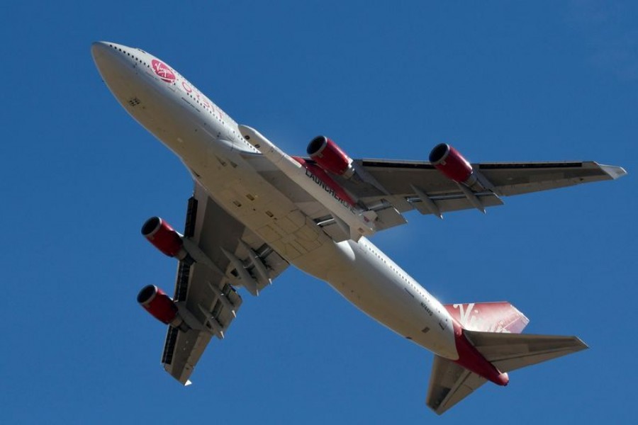 A view of Richard Branson's Virgin Orbit, with a rocket underneath the wing of a modified Boeing 747 jetliner, during test launch of its high-altitude launch system for satellites from Mojave, California, US on January 17, 2021 — Reuters photo