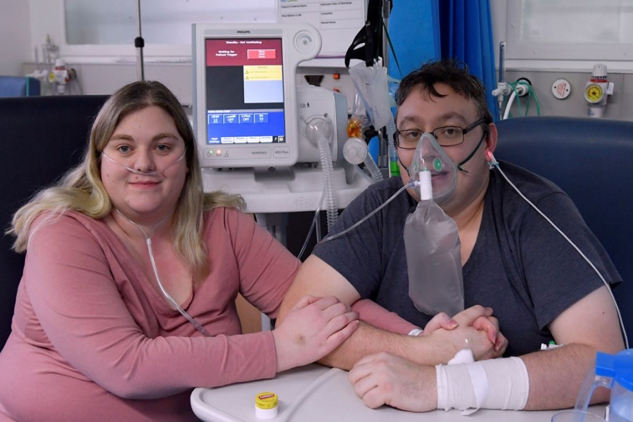Lizzie Kerr, 31, and Simon O'Brien, 36, embrace in a Covid-19 ward, days after they married in an ICU (Intensive Care Unit) when both had become critically ill with the coronavirus disease (Covid-19), and were uncertain of their chances of surviving, in Milton Keynes University Hospital, Milton Keynes, Britain, January 20, 2021 — Reuters