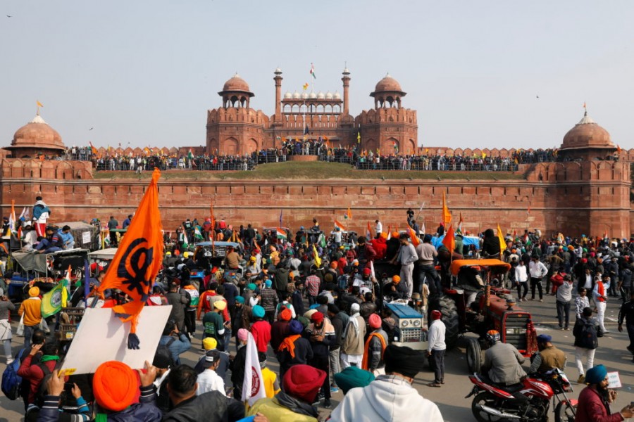 Farmers participate in a protest against farm laws introduced by the government, at the historic Red Fort in Delhi, India, January 26, 2021. REUTERS
