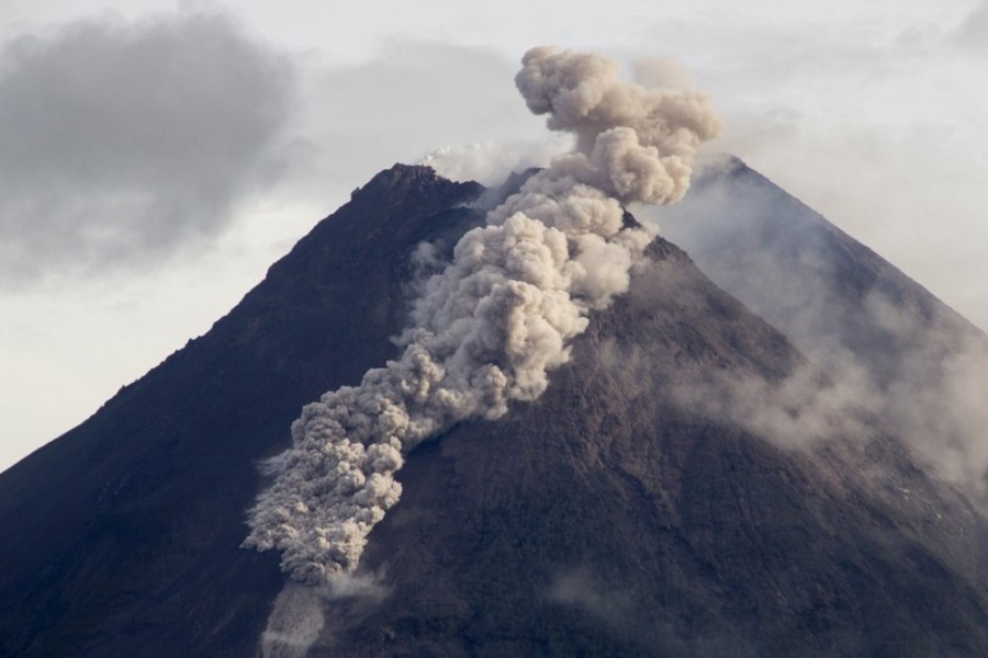 Hot cloud of volcanic materials run down the slope of Mount Merapi during an eruption in Sleman, Wednesday, Jan 27, 2021. Indonesia's most active volcano erupted Wednesday with a river of lava and searing gas clouds flowing 1,500 metres (4,900 feet) down its slopes. (AP Photo/Slamet Riyadi)