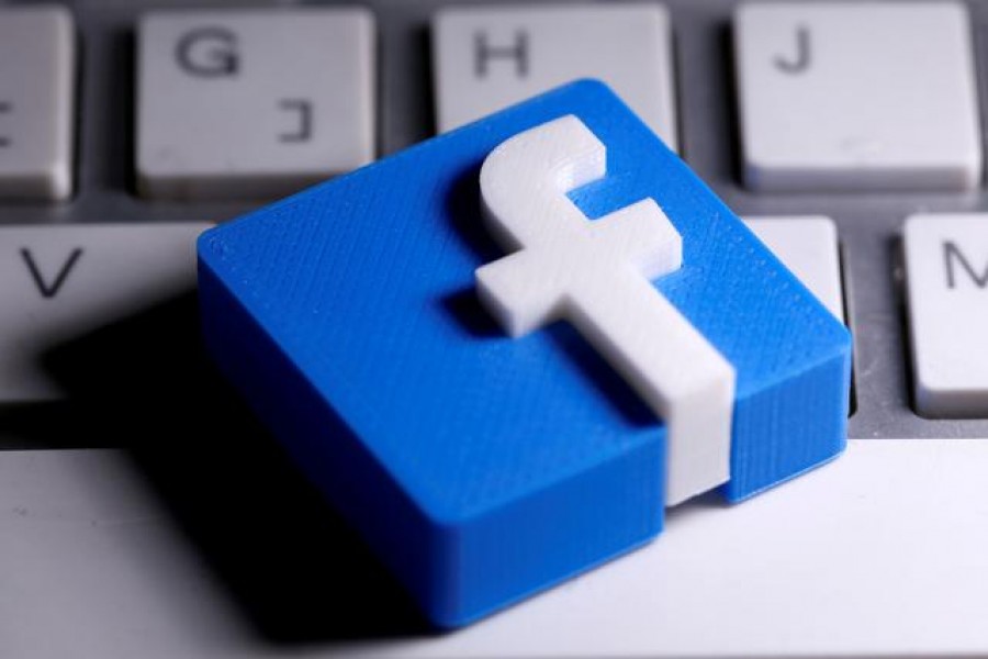 A 3D-printed Facebook logo is seen placed on a keyboard in this illustration taken March 25, 2020 — Reuters/Files