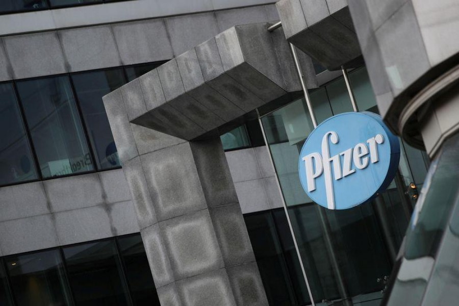 FILE PHOTO: The Pfizer logo is pictured outside a Pfizer office amid the coronavirus disease (COVID-19) outbreak in Brussels, Belgium January 21, 2021. REUTERS/Yves Herman/File Photo