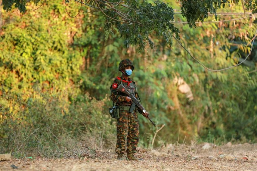 FILE PHOTO: A Myanmar's soldier stands guard near the congress compound in Naypyitaw, Myanmar, February 2, 2021. REUTERS/Stringer