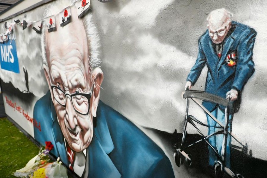 A mural of late record-breaking centenarian Captain Tom Moore, who died on Tuesday, is pictured in Two Gates, Tamworth, Britain February 3, 2021. REUTERS/Jason Cairnduff