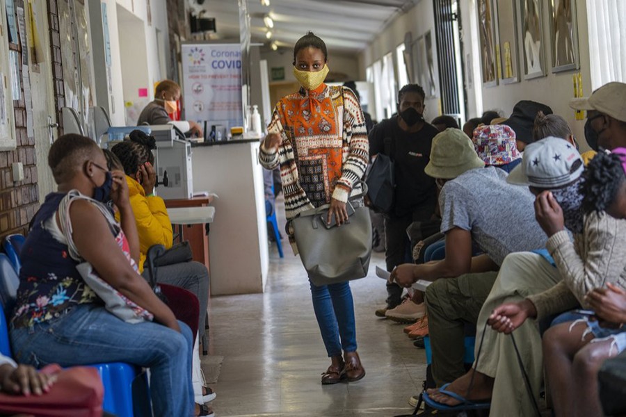 In this November 30, 2020 file photo, volunteers wait to be checked at a vaccine trial facility set at Soweto's Chris Sani Baragwanath Hospital outside Johannesburg, South Africa — AP/Files