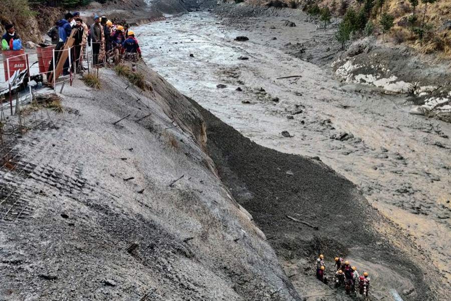 Members of Indo-Tibetan Border Police (ITBP) search for survivors after a Himalayan glacier broke and swept away a small hydroelectric dam, in Chormi village in Tapovan in the northern state of Uttarakhand, India, February 07, 2021 — Reuters