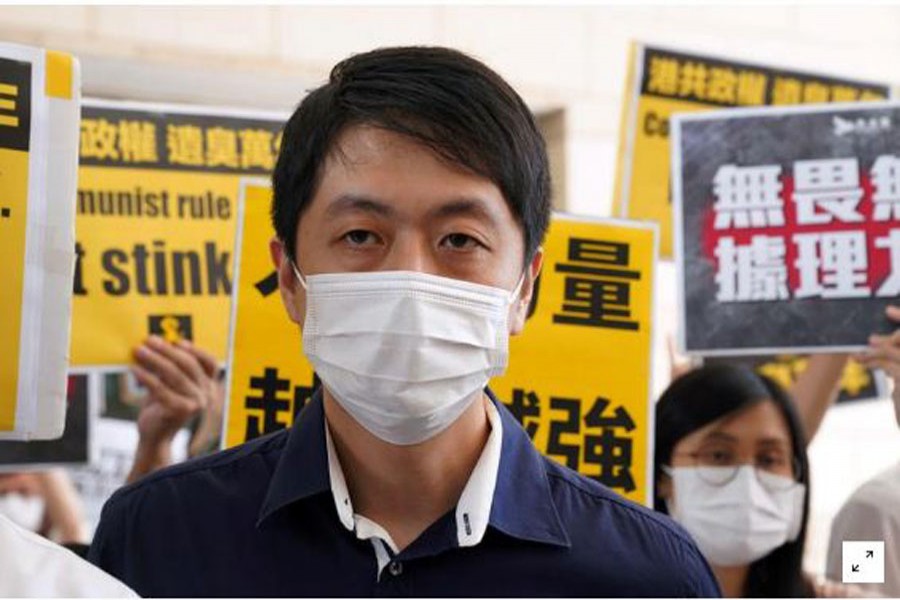 FILE PHOTO: Former pro-democracy lawmaker Ted Hui Chi-fung appears outside West Kowloon Magistrates' Courts in Hong Kong, China November 19, 2020. REUTERS/Lam Yik