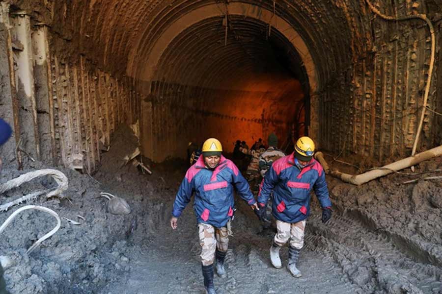 Rescuers struggle to find 35 men trapped in Indian Himalayas tunnel