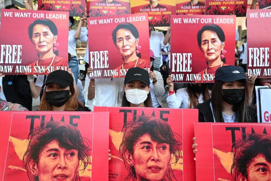 Demonstrators hold up signs during a protest against the military coup, demanding the release of elected leader Aung San Suu Kyi, in Yangon, Myanmar, February 13, 2021 — Reuters/Files