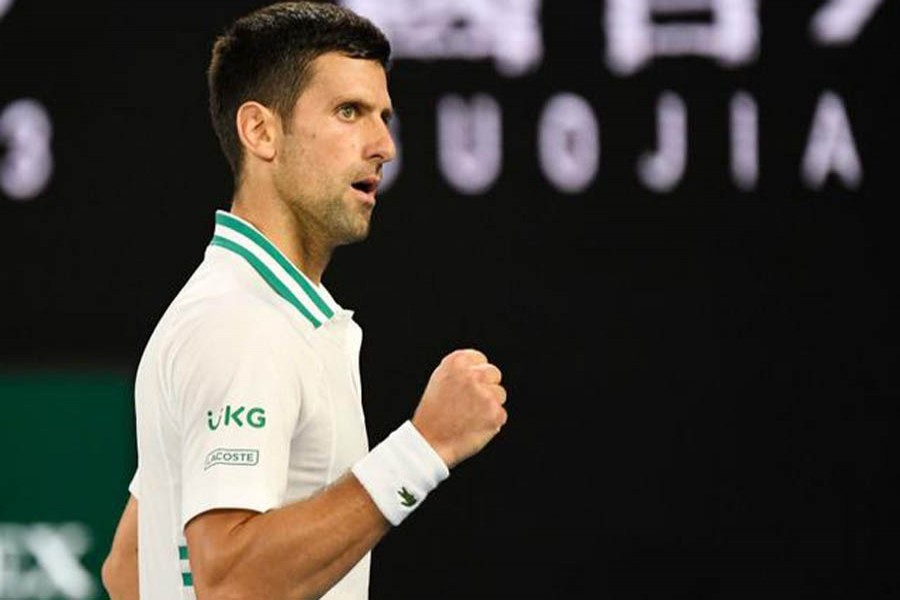 Serbia's Novak Djokovic celebrates during his semi final match against Russia's Aslan Karatsev during Australian Open at Melbourne Park, Melbourne, Australia, February, 18, 2021 — Reuters