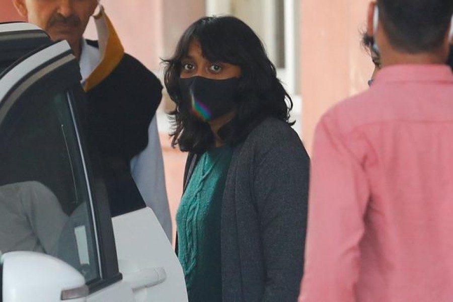 Disha Ravi, a 22-year-old climate activist, leaves after an investigation at National Cyber Forensic Lab, in New Delhi, India, February 23, 2021. REUTERS/Adnan Abidi
