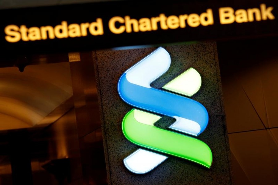 A logo of Standard Chartered is displayed at its main branch in Hong Kong, China on August 1, 2017 — Reuters/Files
