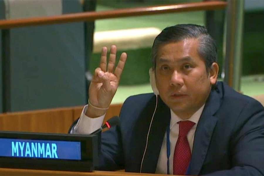 Myanmar's ambassador to the United Nations Kyaw Moe Tun holds up three fingers at the end of his speech to the General Assembly where he pleaded for International action in overturning the military coup in his country on Friday -Reuters photo