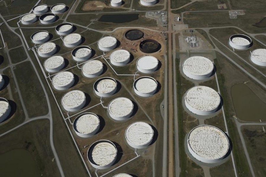 FILE PHOTO: Crude oil storage tanks are seen from above at the Cushing oil hub, in Cushing, Oklahoma, March 24, 2016. REUTERS/Nick Oxford/File Photo