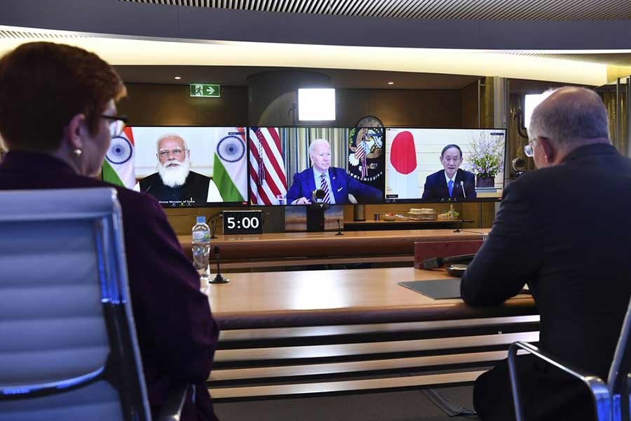 Australia's Prime Minister Scott Morrison, right, and Minister for Foreign Affairs Marise Payne, left, participate in the inaugural Quad leaders meeting with US President Joe Biden, the Japan's Prime Minister Yoshihide Suga and India's Prime Minister of India Narendra Modi in a virtual meeting  on Saturday -AP Photo