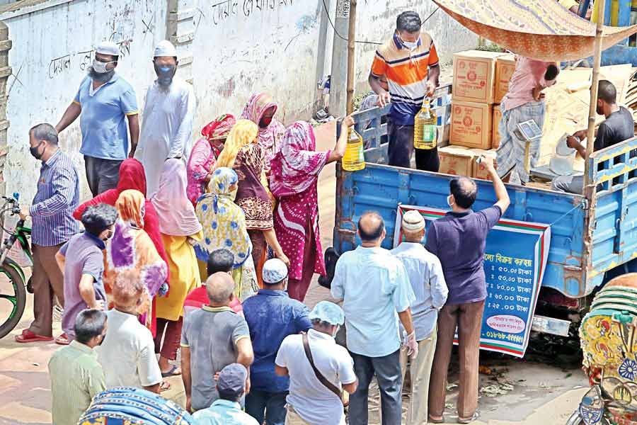 Customers are buying commodities from a TCB truck at the city's Shantinagar area last year — FE file photo