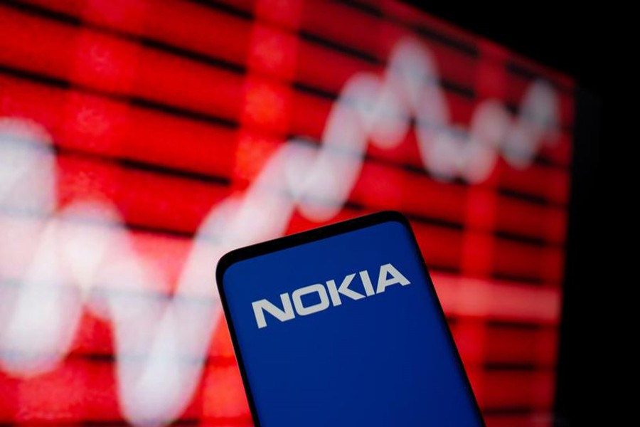 The Nokia logo is seen on a smartphone in front of a displayed stock graph in this illustration taken on February 5, 2021 — Reuters/Files