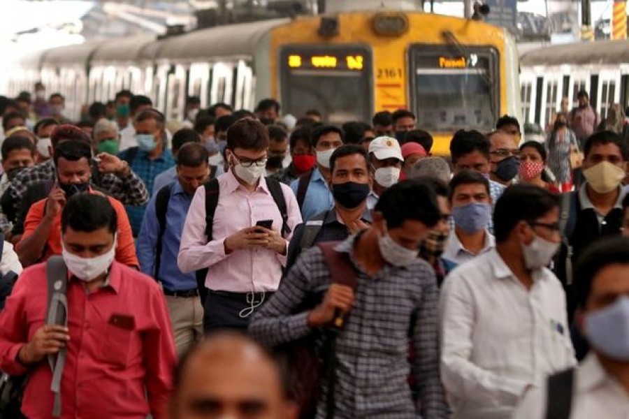 People wearing protective masks walk on a platform at the Chhatrapati Shivaji Terminus railway station, amidst the spread of the coronavirus disease (Covid-19), in Mumbai, India on March 16, 2021 — Reuters photo