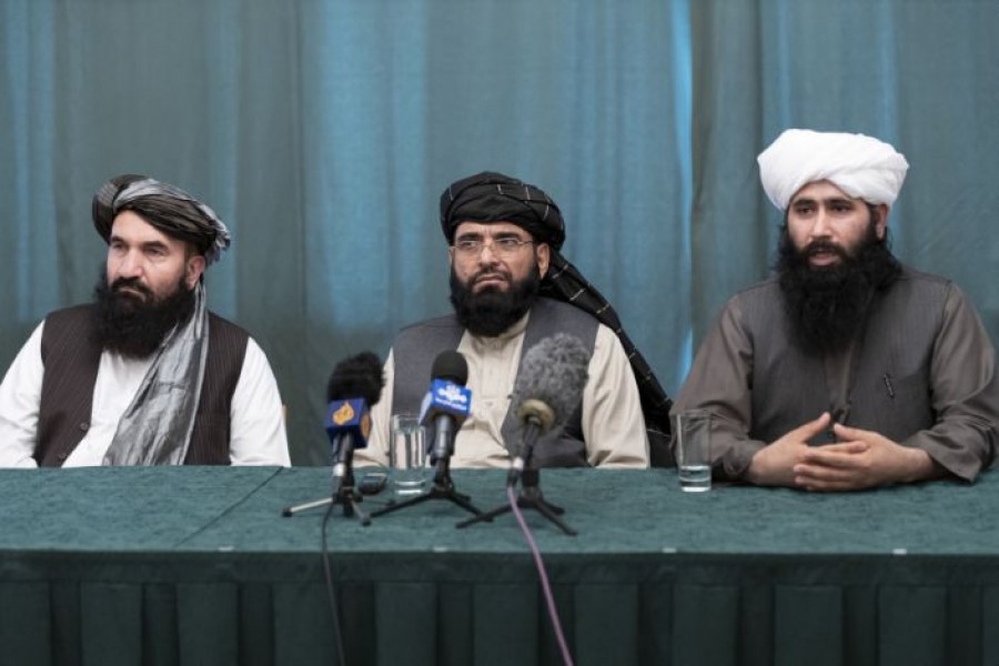 Members of the Taliban delegation: former western Herat Governor Khairullah Khairkhwa, member of the negotiation team Suhail Shaheen and spokesman for the Taliban's political office Mohammad Naeem attend a joint news conference in Moscow, Russia March 19, 2021. Alexander Zemlianichenko/Pool via REUTERS