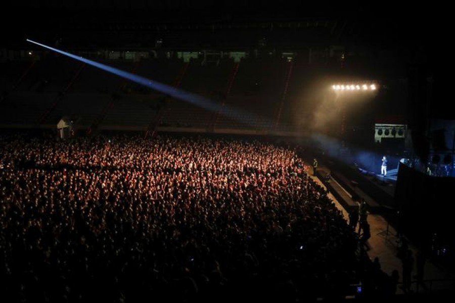 People wearing protective masks attend a concert of "Love of Lesbian" at the Palau Sant Jordi, the first massive concert since the beginning of the coronavirus disease (Covid-19) pandemic in Barcelona, Spain on March 27, 2021 — Reuters photo