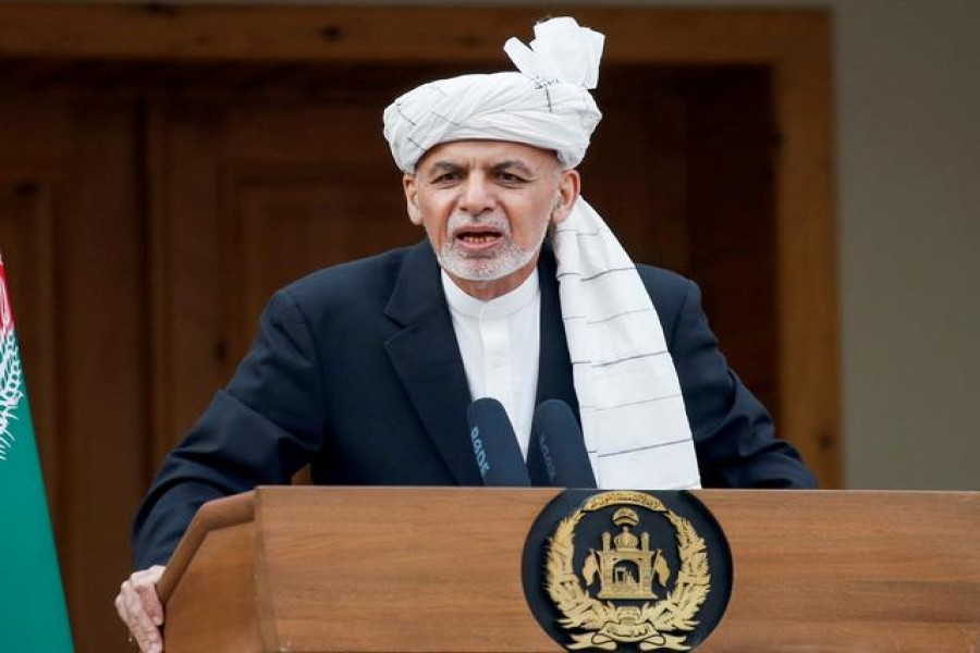 FILE PHOTO: Afghanistan's President Ashraf Ghani speaks during his inauguration as president, in Kabul, Afghanistan March 9, 2020. REUTERS/Mohammad Ismail/File Photo