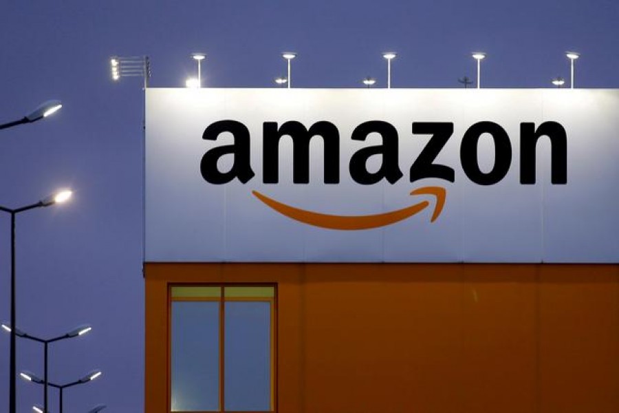 FILE PHOTO: The logo of Amazon in Lauwin-Planque, northern France, February 20, 2017. REUTERS/Pascal Rossignol/File Photo