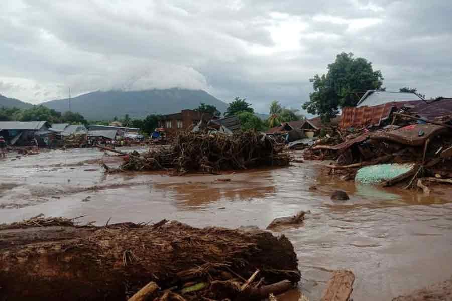 Damaged houses are seen at an area affected by flash floods after heavy rains in East Flores, East Nusa Tenggara province, Indonesia, on Sunday in this photo -Reuters photo