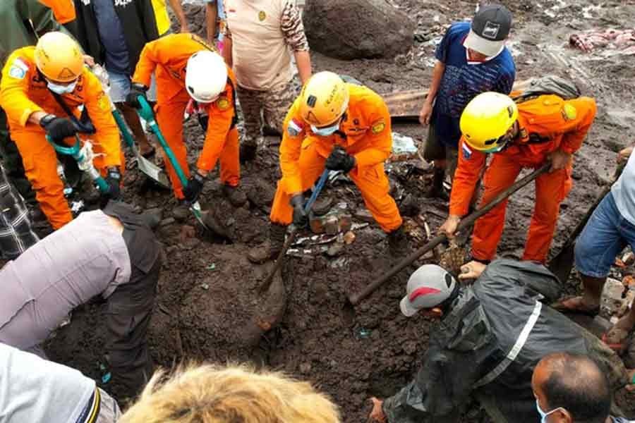 Indonesia rescue agency searching for a body at an area affected by flash floods after heavy rains in East Flores, East Nusa Tenggara province, Indonesia, on Monday  -Reuters photo