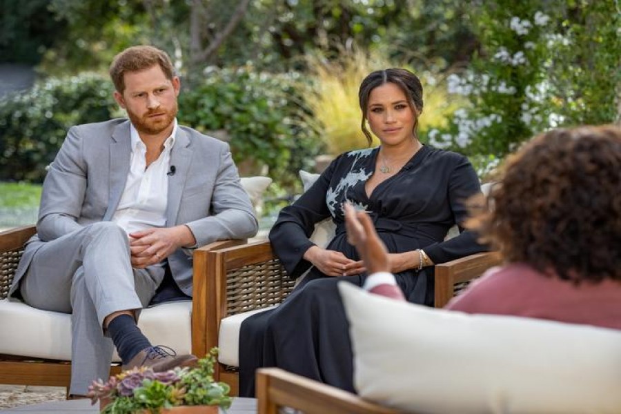 Britain's Prince Harry and Meghan, Duchess of Sussex, are interviewed by Oprah Winfrey in this undated handout photo. Harpo Productions/Joe Pugliese/Handout via REUTERS