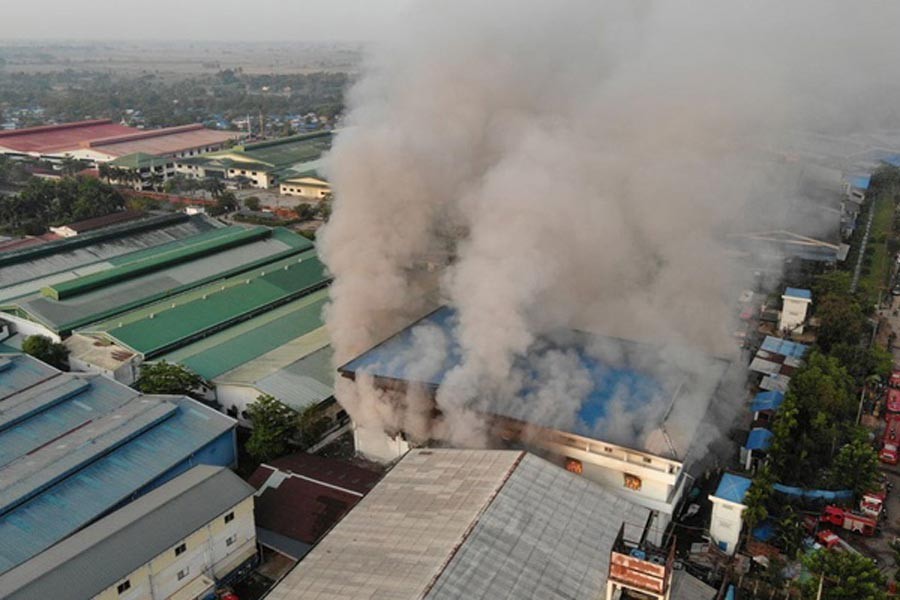 General view of a fire at JOC Galaxy (Myanmar) Apparel Co. in Hlaing Thar Yar township, Yangon, Myanmar on Wednesday -Reuters photo