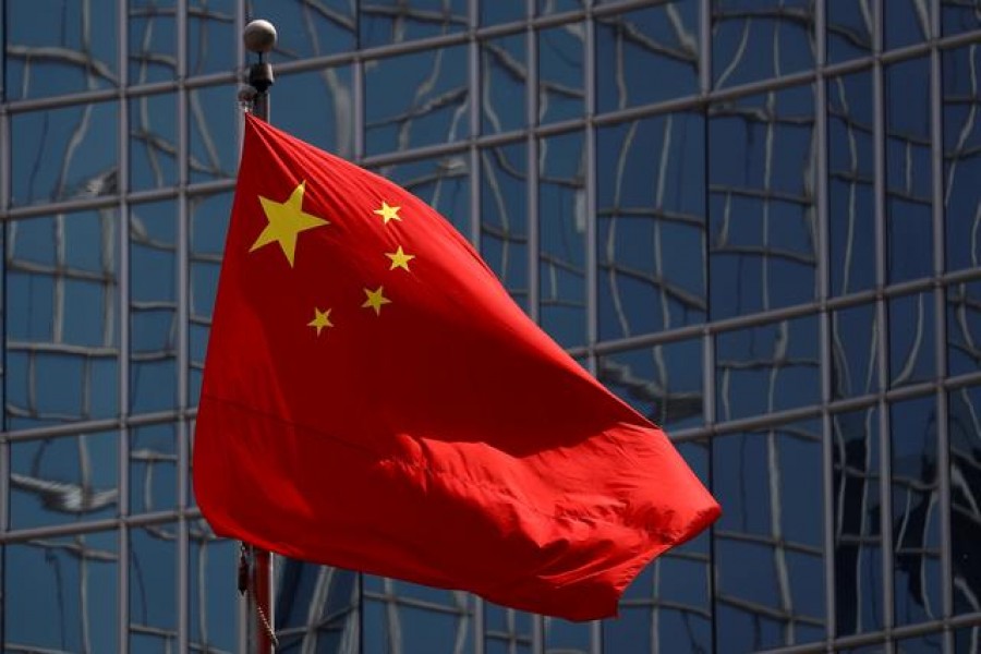 The Chinese national flag is seen in Beijing, China April 29, 2020. REUTERS/Thomas Peter/File Photo/File Photo