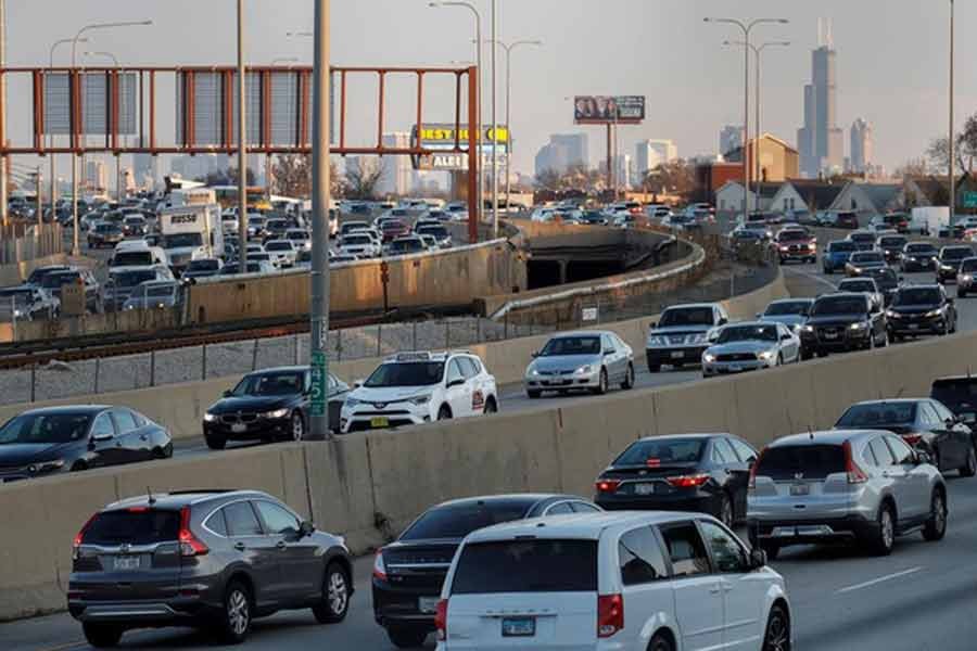 Travelers are stuck in a traffic jam as people hit the road before the busy Thanksgiving Day weekend in US in 2017 -Reuters file photo