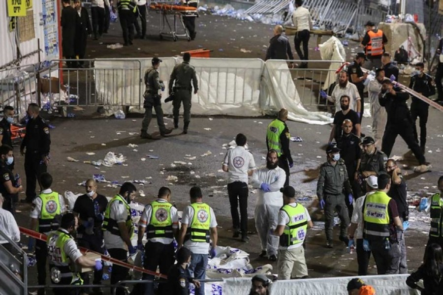 Medics and rescue workers attend to the Lag B'Omer event in Mount Meron, northern Israel, where fatalities were reported among the thousands of ultra-Orthodox Jews gathered at the tomb of a 2nd-century sage for annual commemorations that include all-night prayer and dance, at Mount Meron, Israel, April 30, 2021 — Reuters