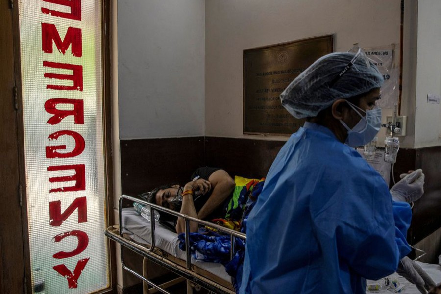 A patient suffering from the coronavirus disease (Covid-19) receives treatment inside the emergency ward at Holy Family hospital in New Delhi, India on April 29, 2021 — Reuters photo