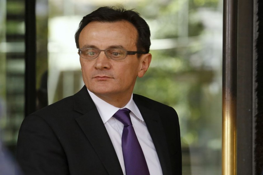 Chief Executive of AstraZeneca Pascal Soriot leaves after appearing at a commons science committee hearing at Portcullis House in London May 14, 2014. REUTERS/Luke MacGregor