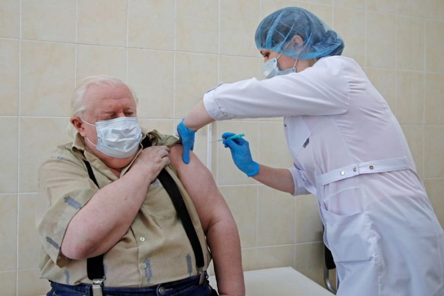 A man receives a dose of the EpiVacCorona vaccine against the coronavirus disease (Covid-19), developed by the Vector Institute in Siberia, at a local clinic in Saint Petersburg, Russia on April 12, 2021 — Reuters/Files