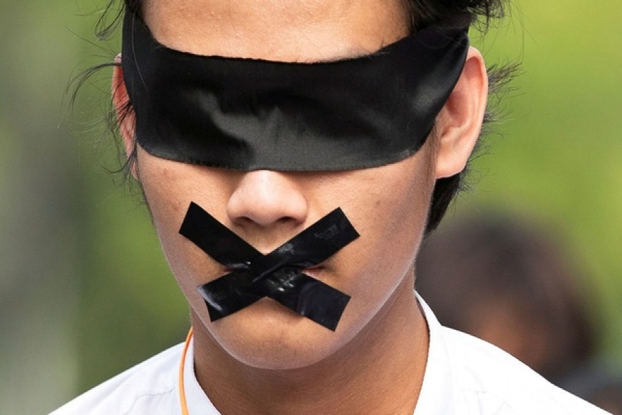 A demonstrator protests against the military coup in Yangon, Myanmar, February 19, 2021 — Reuters