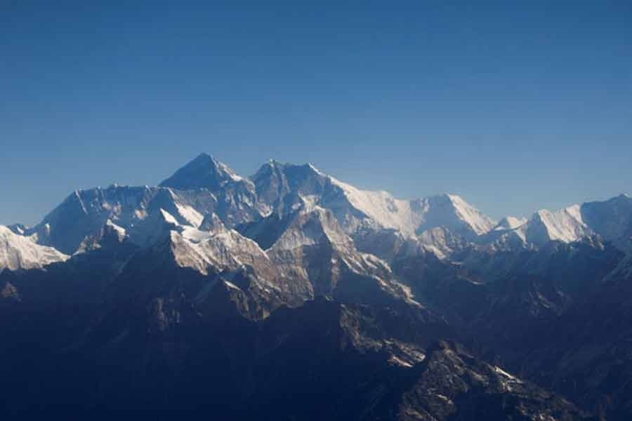 Mount Everest, the world highest peak, and other peaks of the Himalayan range are seen through an aircraft window during a mountain flight from Kathmandu in January last year –Reuters file photo