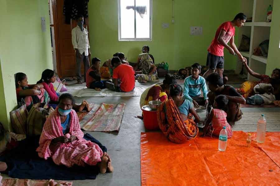 People taking rest inside a shelter after they were evacuated from their houses in coastal areas ahead of Cyclone Yaas in the West Bengal state of India on Tuesday –Reuters Photo