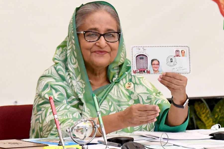 Prime Minister Sheikh Hasina releasing memorial postal stamps, marking the inauguration of the Dak Bhaban during a programme, through a videoconference on Thursday –PID Photo