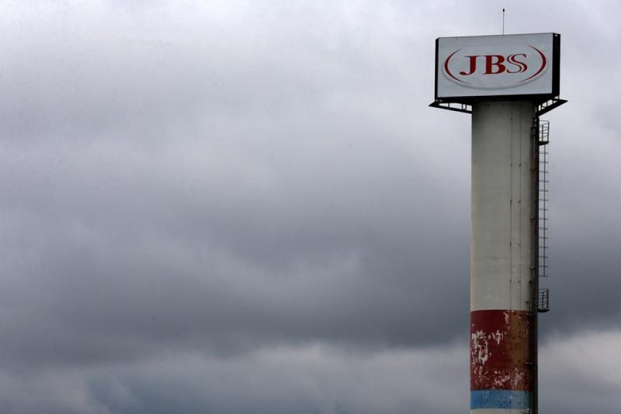 FILE PHOTO: The logo of Brazilian meatpacker JBS SA is seen in the unit in the city of Jundiai, Brazil June 1, 2017. REUTERS/Paulo Whitaker