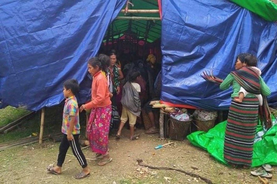 People displaced by fighting in north-western Myanmar between junta forces and anti-junta fighters are seen at a camp in Chin State, Myanmar, May 31, 2021. Picture taken May 31, 2021 — Reuters/Stringer