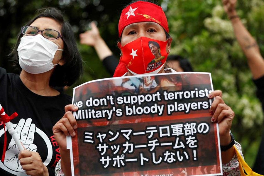 Myanmar protesters residing in Japan hold a rally outside the stadium before the FIFA World Cup Asia Qualifiers football match Japan vs Myanmar at Fukuda Denshi Arena in Chiba, east of Tokyo, Japan on May 28, 2021 — Reuters/Files